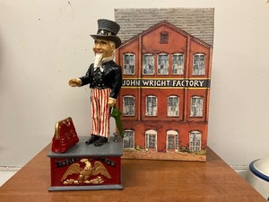 lot 10 image: John Wright mechanical bank Uncle Sam