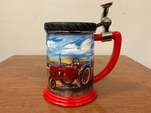 lot 18 image: Franklin Mint The Farmall Model H Collector Tankard by David Henderson Stein