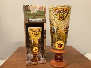 lot 80 image: Ceramic Pilsner Hair of the dog pub