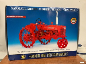 lot 105 image: Franklin Mint Farmall Model H Steel Wheel Tractor 112 Scale Die Cast