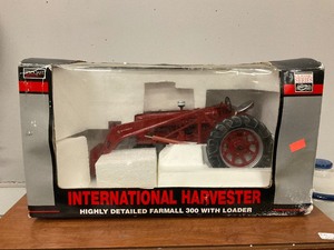 lot 114 image: SpecCast International Harvester Farmall 300 with Loader. 116th scale.