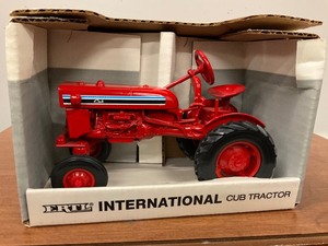 lot 143 image: Ertl International Cub Tractor Model