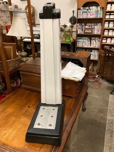 lot 146 image: Coin operated scale.
