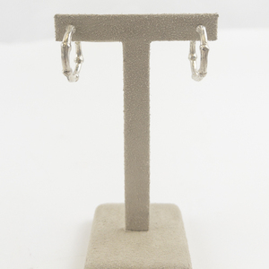 lot 14C image: Tiffany & Co. Sterling Silver Bamboo Hoop Earrings. Estimated Replacement Value $350