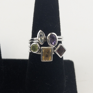 lot 40 image: Group of 5  Stacking Peridot, Amethyst, Garnet, Aquamarine, & Citrine Sterling Silver Rings. Size 10 - 10.25.