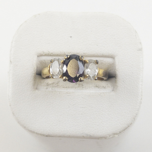 lot 42 image: Three Stone Cz & Amethyst Gold Plated ring. Size 8 - 8.25.