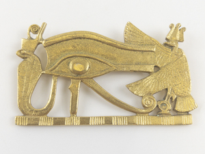 lot 73 image: Metropolitan Museum of Art  1976 Egyptian Udjat Eye of Horus Pectoral gold plated Pendant.