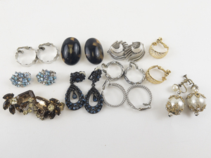 lot 84 image: Group of 10 Base Metal Clip-On Earrings .