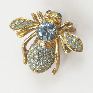 lot 86 image: Joan Rivers Blue Crystal Pave Base Metal Bee Brooch.