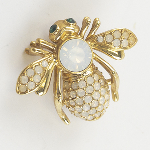 lot 87 image: Joan Rivers&nbspOpal Crystal Pave Base Metal Bee Brooch.