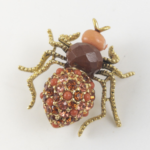 lot 90 image: Joan Rivers&nbspRed Rhinestone Pave Base Metal Spider Brooch.