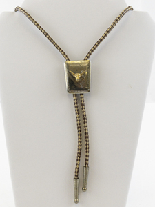 lot 107 image: Longhorn Two Tone Base Metal Bolo Tie Necklace.