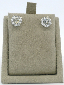 lot 2 image: Pair of 3ct. Total Weight 14k white gold and solitaire lab grown diamond earrings. Estimated Replacement Value $3000