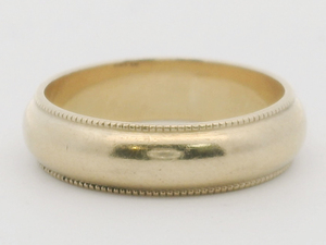 lot 5 image: Ladys 14K Yellow Gold Milgrain Band. Size 7.