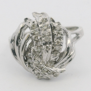 lot 7 image: Diamond 10K White Gold Cocktail Ring. Size 8.75.
