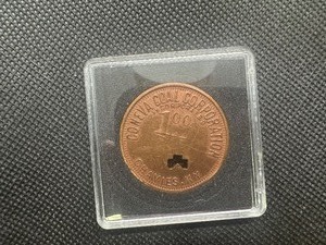lot 6 image: Scarce Coneva Coal Corp $1 Trade Token, Very lightly circulated, this $1 Token is a tougher find.