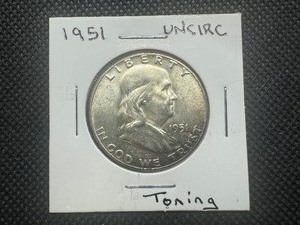 lot 14 image: 1951 Uncirculated Franklin Half Dollar Toner, Unbroken mint luster, very nice