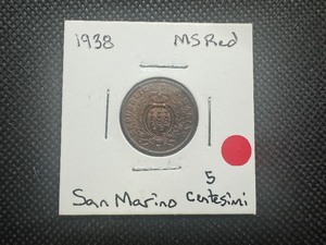 lot 19 image: 1938 Uncirculated San Marino 5 Centesmi. Essentially perfect, deep lustrous red. High MS Likely, Nicest Ive seen.
