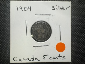 lot 31 image: 1904 Silver Canada 5 Cents. Nicely circulated with honest patina.