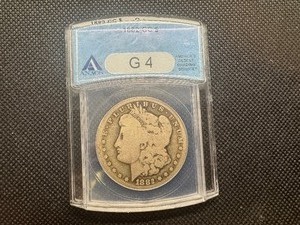 lot 34 image: 1882 CC ANACS G4 Morgan Dollar. Affordable Carson City spot filler