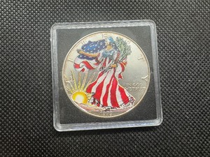 lot 35 image: 1999 Colorized 1 oz Silver Eagle