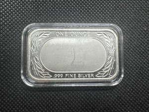 lot 45 image: 1 oz. .999 Silver Flag Bar. Sigma tested.