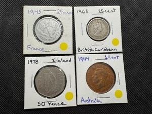 lot 116 image: (4) World Coins. 1942 French 2 Francs, 1944 Aussie Cent, 1965 British Caribbean 25 Cent, 1978 Irish 50 Pence