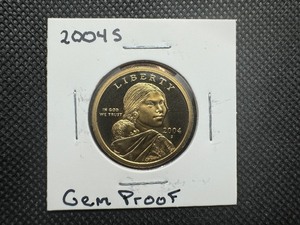 lot 51 image: 2004 S Gem Proof Sacagawea. Essentially flawless, from set, handled once.
