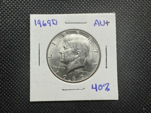 lot 53 image: 1969 D Au40% Silver Kennedy Half Dollar. Essentially a BU. Very slight circulation if at all.