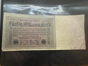 lot 59 image: 1923 Both Versions of the Funfzig Millionen Mark Banknotes. See details below.