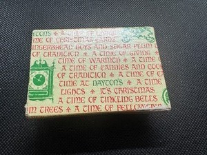 lot 65 image: Assorted Tokens in an Antique Daytons Christmas Gift Box (see details below)