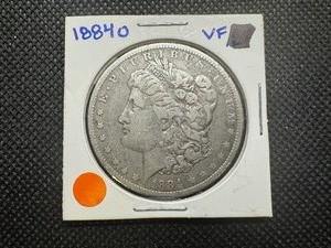 lot 68 image: 1884 O VF Morgan Dollar. Beautiful patina, problem free.