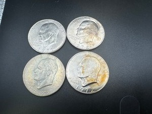lot 71 image: (4) Clad Ike Dollars, 3 are XFAu