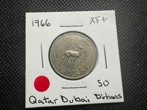 lot 72 image: 1966 XF QatarDubai 50 Dirhams. Tougher find, honest wear & patina.