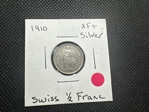lot 94 image: 1910 XF Swiss Silver 12 Franc. Trouble free, light wear, honest patina.