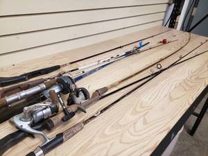 lot 14 image: 8 fishing rods & 3 with reels