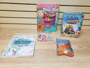 lot 29 image: Nail art kit, Sealife Terrarium, Nighty night book, Drawing book