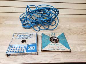 lot 54 image: Extension cord and 2 rolls of utility cloth not full rolls
