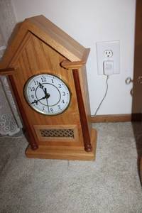 lot 1 image: Vintage Wooden Mantel Clock with Decorative Panel