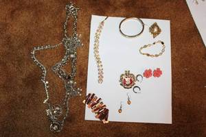 lot 40 image: Assorted Vintage Jewelry Collection with Necklaces, Bracelets, and Earrings