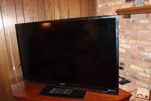 lot 61 image: Sharp 52 LCD TV Model LC-52LE830U with Dual Remotes