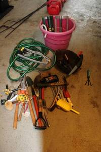 lot 76 image: Comprehensive Garden Tool Collection with Hose, Bucket, and Accessories