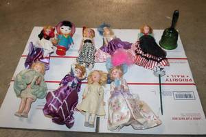 lot 95 image: Collection of 11 Vintage Dolls with Diverse Costumes