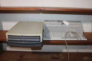lot 103 image: Used Apple Duo Dock with Two Keyboards