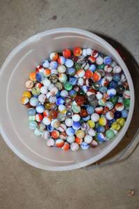 lot A-107 image: Collection of Assorted Colorful Marbles in Bucket