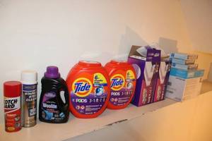 lot 125 image: Assorted Household Cleaning Supplies with Tide Pods and Swiffer WetJet