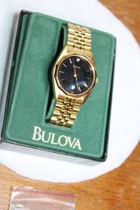 Bulova Gold Tone Watch with Extra Links