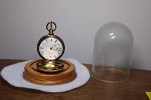lot A-148 image: Antique Gold Pocket Watch with Display Dome and Stand