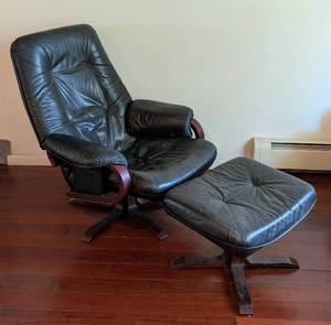lot 17 image: Vintage Danish Style Black Leather Armchair and Ottoman