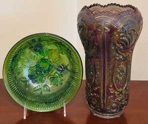 lot 105 image: Imperial Glass Company Including Iridescent Purple Footed Candy Dish and Scroll and Open Rose Helios Green Carnival Bowl